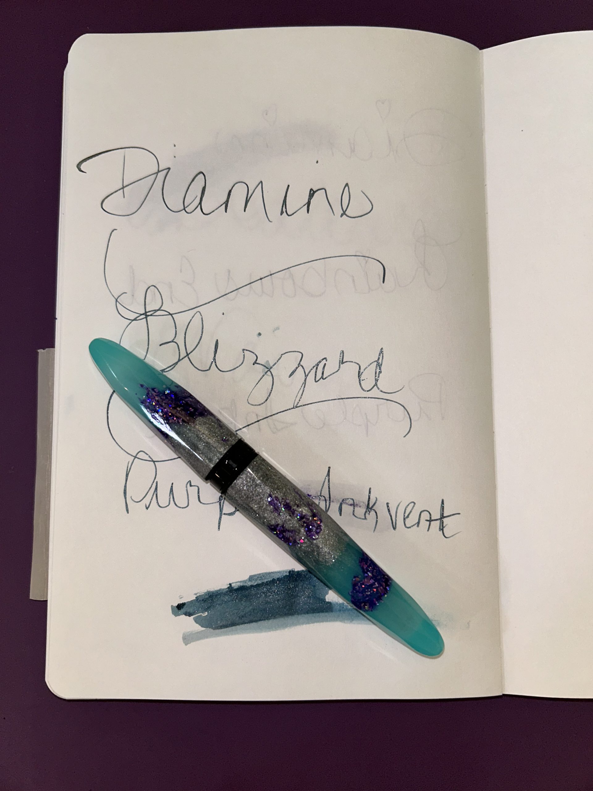 Benu Luminous Lagoon Briolette fountain pen with the Diamine Blizzard ink